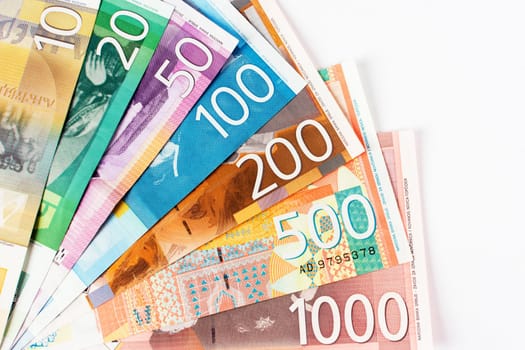 Serbian dinar banknotes paper currency, cash on white background.