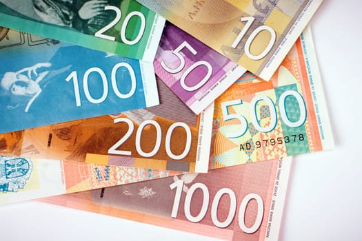 Serbian dinar banknotes paper currency on white background.