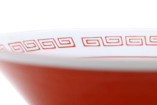 Empty ramen donburi of traditional raimon pattern on white background