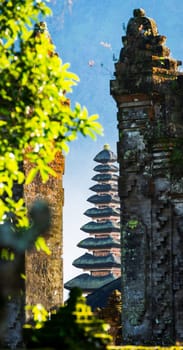 Pura Ulun Danu Beratan temple seen through a stone gate in Bali, Indonesia