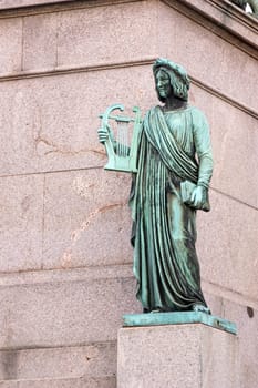 Art and science, statue in the foot of the King Wilhelm column at Schlossplatz, Stuttgart
