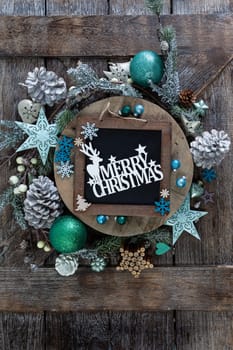 Festive decorations for a cheerful Christmas season on a wooden background