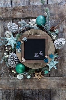 Festive decorations for a cheerful Christmas season on a wooden background