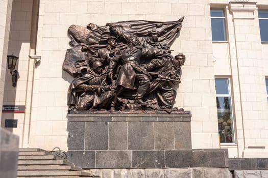 Volgograd, Russia - August 26, 2019: Bronze statue to the right of the entrance to the building of the Volgograd 1 railway station, Volgograd region of the Volga railway, Russia