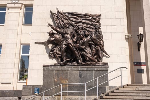 Volgograd, Russia - August 26, 2019: Bronze statue to the left of the entrance to the building of the Volgograd 1 railway station, Volgograd region of the Volga railway, Russia
