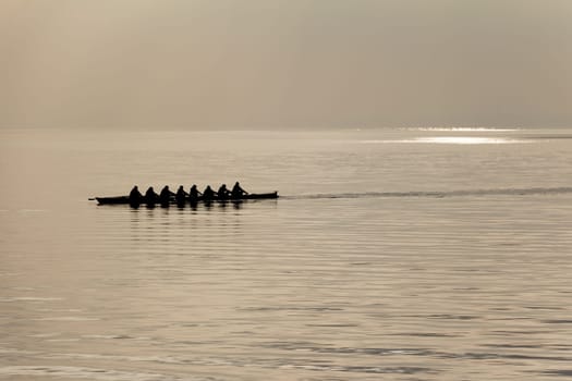 Friendship togetherness recreation sport activity on river, lake or sea. Sporty hobby training kayaking session for fitness and power.
