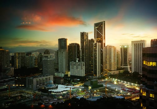 Cityscape with modern and developmental ,twilight scene ,Kuala Lumpur ,Malaysia .