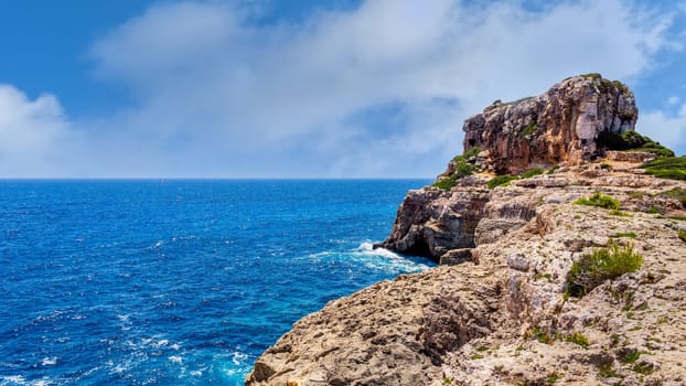 Panorama of beautiful beach and bay with turquoise sea water, Cala des Moro, Santanyi, Mallorca island, Spain