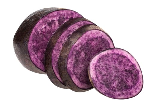 Purple potato (Solanum tuberosum), partially sliced tuber, isolated