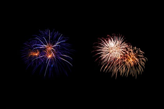 abstract Fireworks light up the dark sky background