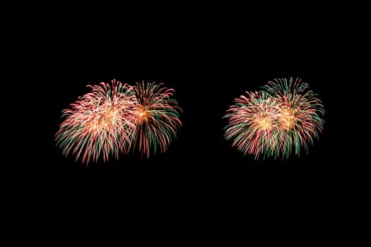 abstract Fireworks light up the dark sky background