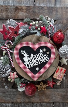 Festive decorations for a cheerful Christmas season on a wooden background