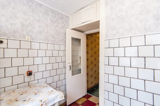 Russia, Moscow- May 16, 2019: interior room apartment. standard repair decoration in hostel. kitchen and dining room