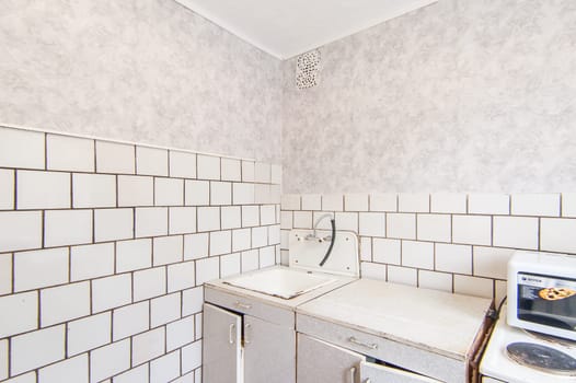 Russia, Moscow- May 16, 2019: interior room apartment. standard repair decoration in hostel. kitchen and dining room