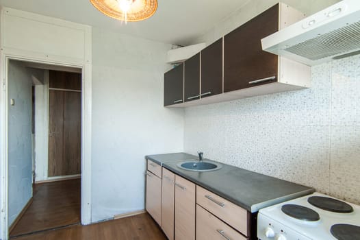 Russia, Moscow- May 16, 2019: interior room apartment. standard repair decoration in hostel. kitchen and dining room