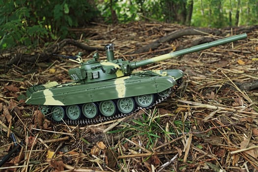 green camouflage tank T-72, side view