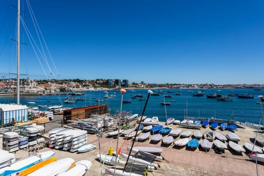 Many sailing boats in the yacht club dry land storage area, in Cascais Bay, Portugal