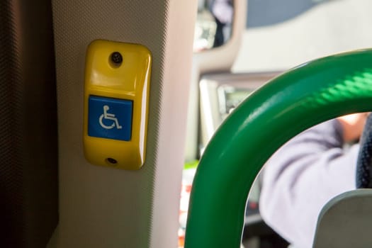 Inside button on tourists bus for handicapped people