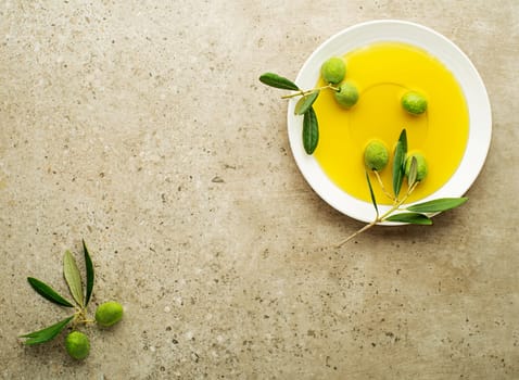 Healthy olive oil with olives ingredients close up. Healthy concept