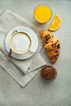 Breakfast served with croissants, coffee and juice. Delicious continental breakfast.
