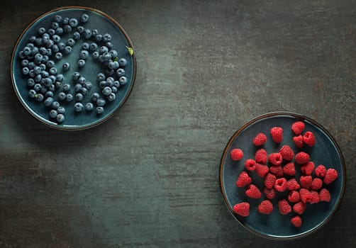 Berries overhead closeup colorful assorted mix of blueberry and raspberry