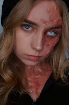 young blond woman with sfx makeup