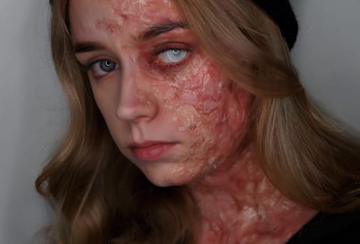 young blond woman with sfx makeup