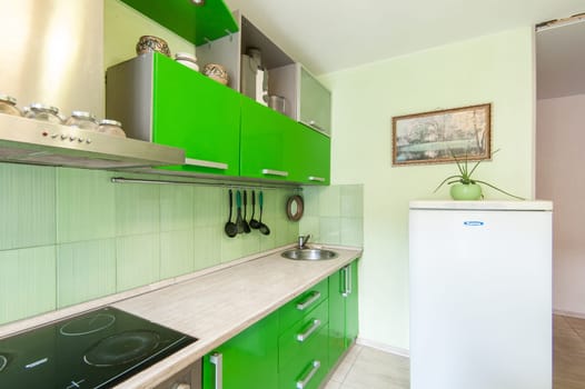 Russia, Moscow- May 17, 2019: interior room apartment. standard repair decoration in hostel. kitchen and dining room