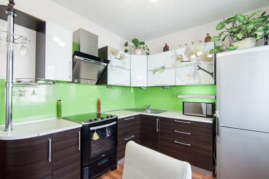 Russia, Moscow- May 17, 2019: interior room apartment. standard repair decoration in hostel. kitchen and dining room