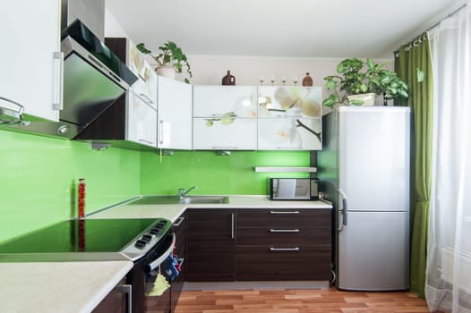 Russia, Moscow- May 17, 2019: interior room apartment. standard repair decoration in hostel. kitchen and dining room