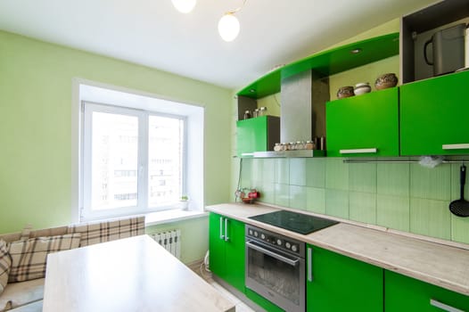 Russia, Moscow- May 17, 2019: interior room apartment. standard repair decoration in hostel. kitchen and dining room