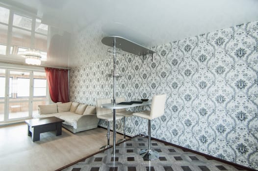 Russia, Moscow- May 17, 2019: interior room apartment. standard repair decoration in hostel. kitchen and dining room