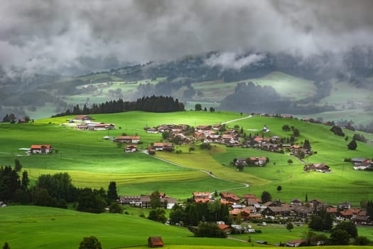 Aerial View on Obermaiselstein in the Fog. Oberallgau, Germany