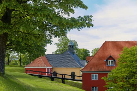 COPENHAGEN, DENMARK - MAY 25, 2017: Red houses in the historical Fortress Kastellet in Copenhagen