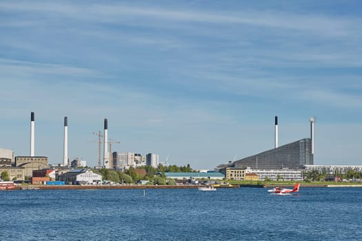COPENHAGEN, DENMARK - MAY 25, 2017: Amager Bakke / Copenhill Waste-to-Energy Power Plant in Copenhagen. The rooftop ski area opens Friday 4 October 2019.