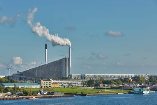 COPENHAGEN, DENMARK - MAY 25, 2017: Amager Bakke / Copenhill Waste-to-Energy Power Plant in Copenhagen. The rooftop ski area opens Friday 4 October 2019.