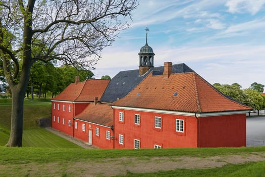 COPENHAGEN, DENMARK - MAY 25, 2017: Red houses in the historical Fortress Kastellet in Copenhagen