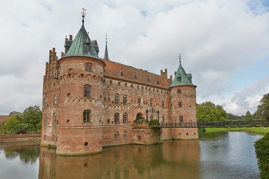 FUNEN, DENMARK - SEPTEMBER 17, 2017: Egeskov Castle is Europe's best preserved Renaissance water castle and it's located in the south of the island of Funen in Denmark