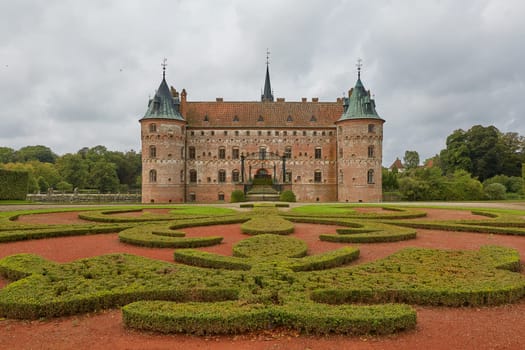 FUNEN, DENMARK - SEPTEMBER 17, 2017: Egeskov Castle is Europe's best preserved Renaissance water castle and it's located in the south of the island of Funen in Denmark