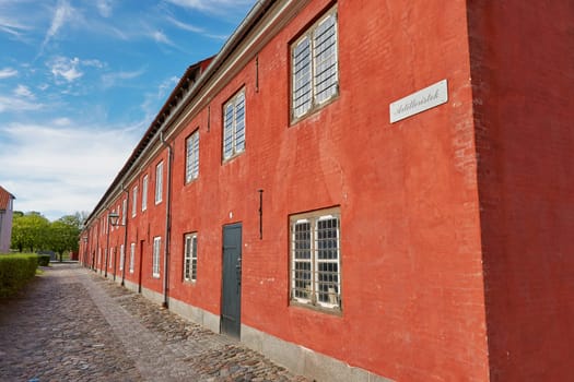 COPENHAGEN, DENMARK - MAY 25, 2017: Red houses in the historical Fortress Kastellet in Copenhagen