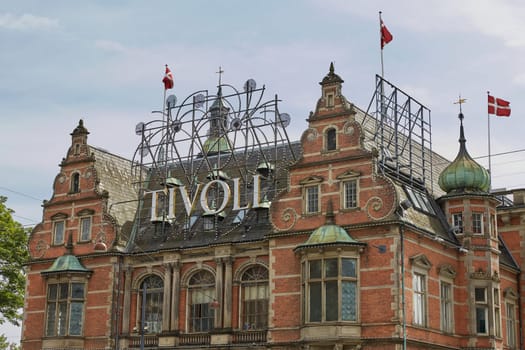 COPENHAGEN, DENMARK - JUNE 28, 2017: The main entrance gate into Tivoli amusement park in Copenhagen, Denmark.