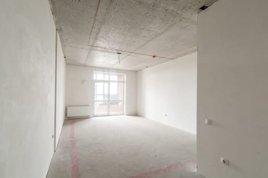 Russia, Moscow- May 17, 2019: interior room apartment. standard repair decoration in hostel. self-finish rough repair