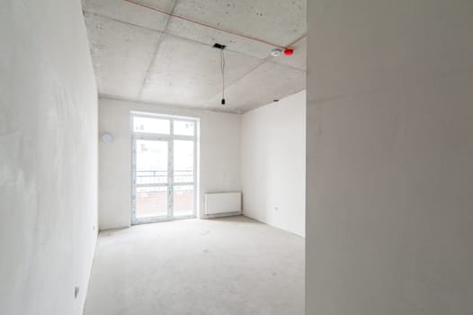 Russia, Moscow- May 17, 2019: interior room apartment. standard repair decoration in hostel. self-finish rough repair