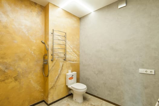Russia, Moscow- May 20, 2019: interior room apartment. standard repair decoration in hostel. modern bathroom, sink, decoration elements, toilet.