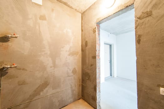 Russia, Moscow- May 17, 2019: interior room apartment. standard repair decoration in hostel. self-finish rough repair