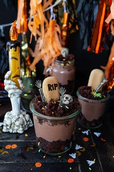 Scary dessert for Hallowen made from chocolate cake and chocolate mousse