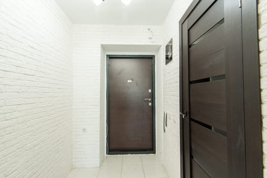 Russia, Moscow- May 20, 2019: interior room apartment. standard repair decoration in hostel. room doors, repair