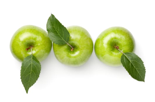 Green apples with leaves isolated on white background. Fresh granny smith apple. Top view, flat lay