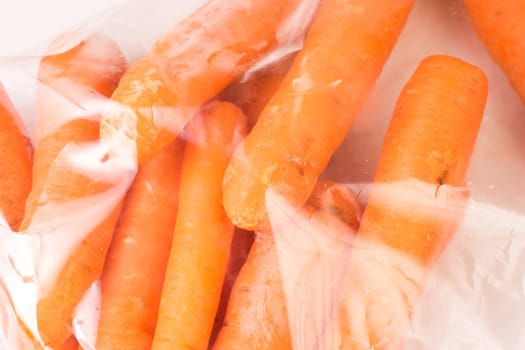 Bunch of organic Carrots packaged in plastic bag