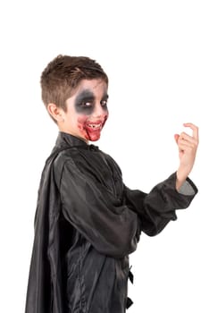 Boy with face-paint and vampire Halloween costume isolated in white